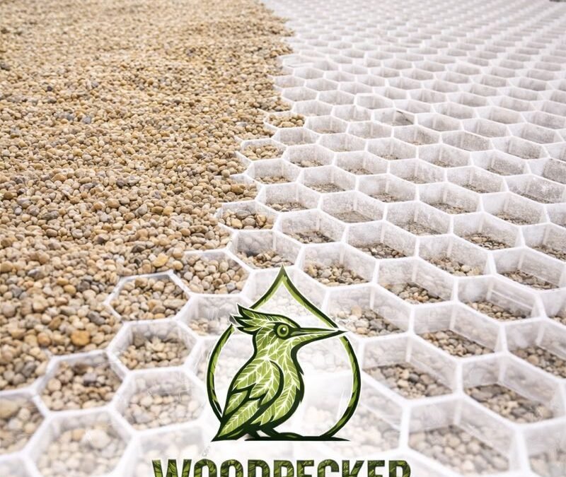 Pose de gravier dans dalles nid d’abeille pour allée carrossable par paysagiste en Seine-et-Marne